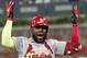 CORRECTS TO DOUBLE, INSTEAD OF SINGLE - St. Louis Cardinals' Marcell Ozuna celebrates his two-run double against the Atlanta Braves in the ninth inning during Game 1 of a best-of-five National League Division Series, Thursday, Oct. 3, 2019, in Atlanta. (AP Photo/John Bazemore)