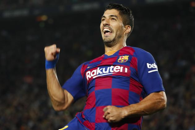Barcelona's Luis Suarez celebrates after scoring the opening goal during Spanish La Liga soccer match between Barcelona and Sevilla at the Camp Nou stadium in Barcelona, Sunday, Oct. 6, 2019. (AP Photo/Joan Monfort)