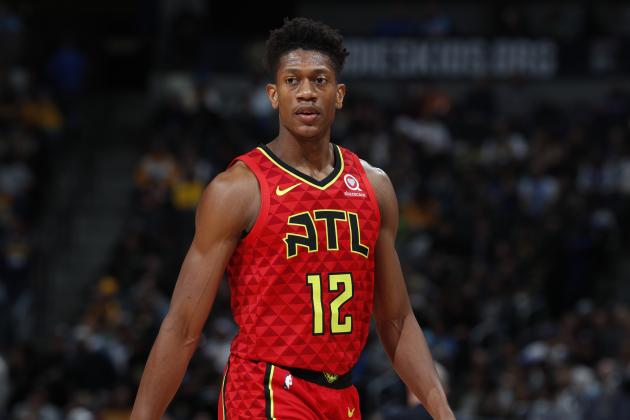 Atlanta Hawks forward De'Andre Hunter (12) in the first half of an NBA basketball game Tuesday, Nov. 12, 2019, in Denver. (AP Photo/David Zalubowski)