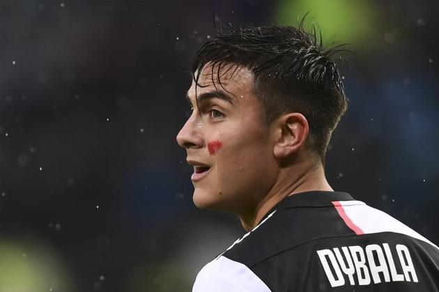Juventus' Argentine forward Paulo Dybala has a red streak on his cheek as part of an initiative targeting domestic violence against women, during the Italian Serie A football match Atalanta Bergamo vs Juventus on November 23, 2019 at the Atleti Azzurri d'Italia stadium in Bergamo. - The