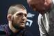 Khabib Nurmagomedov, left, listens to Dana White during a news conference for the UFC 229 mixed martial arts bouts Thursday, Oct. 4, 2018, in Las Vegas. Nurmagomedov is scheduled to fight Conor McGregor on Saturday in Las Vegas. (AP Photo/John Locher)