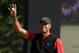 Tiger Woods of the United States reacts after his putt on the 18th hole during the final round of the Zozo Championship PGA Tour at the Accordia Golf Narashino country club in Inzai, east of Tokyo, Japan, Monday, Oct. 28, 2019. (AP Photo/Lee Jin-man)