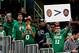 BOSTON, MASSACHUSETTS - NOVEMBER 27: A fan holds a sign with photos of Kyrie Irving and Kemba Walker before the game between the Boston Celtics and the Brooklyn Nets at TD Garden on November 27, 2019 in Boston, Massachusetts. (Photo by Maddie Meyer/Getty Images)