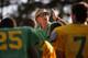 FILE - In this Oct. 24, 2012, file photo, Summerville High School coach John McKissick coaches his team during practice in Summerville, S.C. McKissick, whose 621 victories at South Carolina’s Summerville High made him the nation’s winningest football coach at any level, has died at age 93. Dorchester County Coroner Paul Brouthers said McKissick had been in hospice care and died Thursday, Nov. 28, 2019, surrounded by family. (AP Photo/Stephen Morton, File)