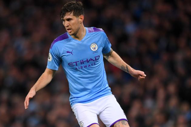 MANCHESTER, ENGLAND - NOVEMBER 23: John Stones of Manchester City runs with the ball during the Premier League match between Manchester City and Chelsea FC at Etihad Stadium on November 23, 2019 in Manchester, United Kingdom. (Photo by Laurence Griffiths/Getty Images)