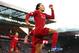 LIVERPOOL, ENGLAND - NOVEMBER 30: Virgil van Dijk of Liverpool celebrates after scoring his teams first goal during the Premier League match between Liverpool FC and Brighton & Hove Albion at Anfield on November 30, 2019 in Liverpool, United Kingdom. (Photo by Clive Brunskill/Getty Images)