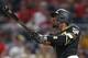 Pittsburgh Pirates' Starling Marte hits a two-run home run in the eight inning to take the lead in the eighth inning of a baseball game against the Washington Nationals, Tuesday, Aug. 20, 2019, in Pittsburgh. The Pirates won 4-1. (AP Photo/Keith Srakocic)