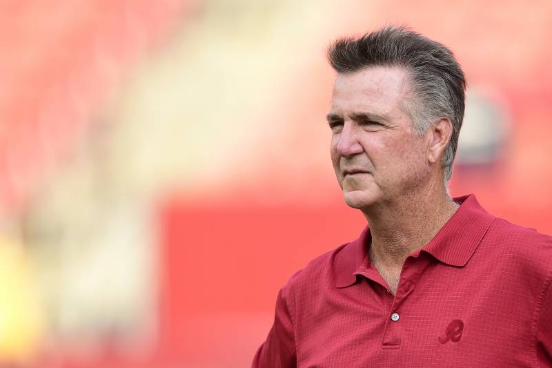LANDOVER, MD - AUGUST 15: Washington Redskins team president Bruce Allen watches the Redskins warm up before a preseason game against the Cincinnati Bengals at FedExField on August 15, 2019 in Landover, Maryland. (Photo by Patrick McDermott/Getty Images)