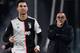 Juventus' Italian coach Maurizio Sarri (R) looks on as Juventus' Portuguese forward Cristiano Ronaldo runs past during the UEFA Champions League Group D football match Juventus Turin vs Atletico Madrid on November 26, 2019 at the Juventus Allianz stadium in Turin. (Photo by Marco Bertorello / AFP) (Photo by MARCO BERTORELLO/AFP via Getty Images)
