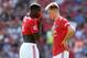 MANCHESTER, ENGLAND - AUGUST 24: Paul Pogba and Scott McTominay of Manchester United in discussion during the Premier League match between Manchester United and Crystal Palace at Old Trafford on August 24, 2019 in Manchester, United Kingdom. (Photo by Michael Regan/Getty Images)