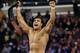 Jose Alberto Rodríguez, of Mexico, known as Alberto Del Rio, celebrates after defeating Jacob