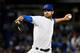 CHICAGO, ILLINOIS - SEPTEMBER 16: Starting pitcher Cole Hamels #35 of the Chicago Cubs delivers the ball in the first inning against the Cincinnati Reds at Wrigley Field on September 16, 2019 in Chicago, Illinois. (Photo by Quinn Harris/Getty Images)