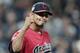 FILE - In this Sept. 20, 2019, file photo, Cleveland Indians relief pitcher Carlos Carrasco pumps his fist after the Indians defeated the Philadelphia Phillies 5-2 in a baseball game in Cleveland. Carrasco was selected as the 2019 Roberto Clemente Award winner, given annually by Major League Baseball to honor sportsmanship and community involvement, the league announced Friday, Oct. 5, 2019. (AP Photo/Tony Dejak, File)