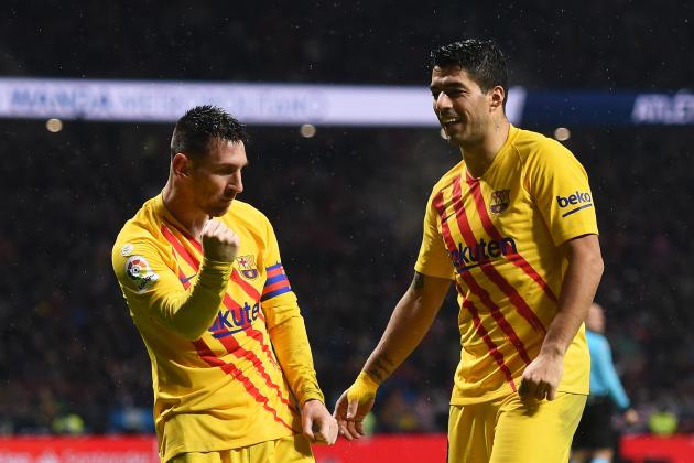 MADRID, SPAIN - DECEMBER 01: Lionel Messi of FC Barcelona celebrates after scoring his team's first goal with Luis Suarez during the Liga match between Club Atletico de Madrid and FC Barcelona at Wanda Metropolitano on December 01, 2019 in Madrid, Spain. (Photo by Denis Doyle/Getty Images)