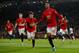 MANCHESTER, ENGLAND - DECEMBER 04: Marcus Rashford of Manchester United celebrates after scoring a goal to make it 2-1 during the Premier League match between Manchester United and Tottenham Hotspur at Old Trafford on December 4, 2019 in Manchester, United Kingdom. (Photo by Matthew Ashton - AMA/Getty Images)