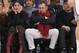 Executive chairman and Madison Square Garden CEO James Dolan, center, watches during the first half of an NBA basketball game between the New York Knicks and the Sacramento Kings in New York, Sunday, Nov. 3, 2019. The Kings defeated the Knicks 113-92. (AP Photo/Kathy Willens)