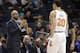New York Knicks head coach David Fizdale, left, talks with Kevin Knox (20) during the first half of an NBA basketball game against the Charlotte Hornets in Charlotte, N.C., Monday, Jan. 28, 2019. (AP Photo/Chuck Burton)