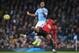 MANCHESTER, ENGLAND - DECEMBER 07: Raheem Sterling of Manchester City collides with Aaron Wan-Bissaka of Manchester United during the Premier League match between Manchester City and Manchester United at Etihad Stadium on December 07, 2019 in Manchester, United Kingdom. (Photo by Laurence Griffiths/Getty Images)