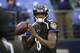 Baltimore Ravens quarterback Lamar Jackson (8) warms up before an NFL football game against the San Francisco 49ers, Sunday, Dec. 1, 2019, in Baltimore, Md. (AP Photo/Nick Wass)