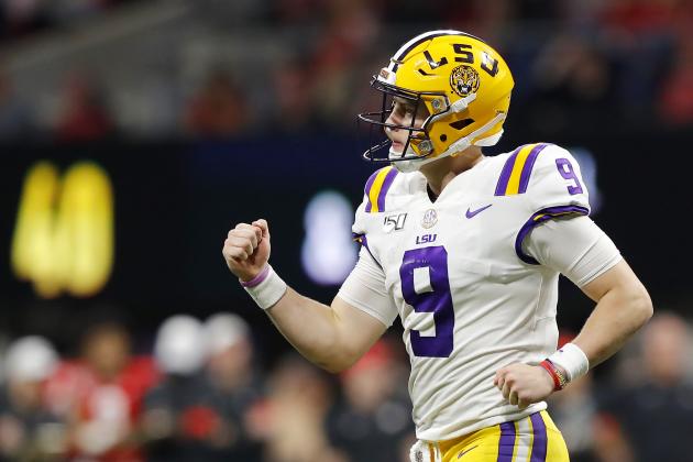ATLANTA, GEORGIA - DECEMBER 07: Joe Burrow #9 of the LSU Tigers celebrates after throwing a touchdown pass to Terrace Marshall Jr. #6 (not pictured) in the third quarter against the Georgia Bulldogs during the SEC Championship game at Mercedes-Benz Stadium on December 07, 2019 in Atlanta, Georgia. (Photo by Kevin C. Cox/Getty Images)