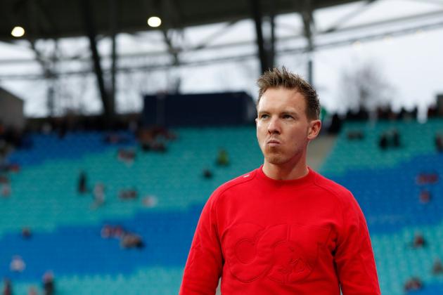Leipzig's German headcoach Julian Nagelsmann watches the warm up session before the German first division Bundesliga football match RB Leipzig v Hoffenheim in Leipzig on December 7, 2019. (Photo by Odd ANDERSEN / AFP) / DFL REGULATIONS PROHIBIT ANY USE OF PHOTOGRAPHS AS IMAGE SEQUENCES AND/OR QUASI-VIDEO (Photo by ODD ANDERSEN/AFP via Getty Images)