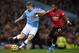 Manchester City's Belgian midfielder Kevin De Bruyne (L) vies with Manchester United's Brazilian midfielder Fred (R) during the English Premier League football match between Manchester City and Manchester United at the Etihad Stadium in Manchester, north west England, on December 7, 2019. (Photo by Oli SCARFF / AFP) / RESTRICTED TO EDITORIAL USE. No use with unauthorized audio, video, data, fixture lists, club/league logos or 'live' services. Online in-match use limited to 120 images. An additional 40 images may be used in extra time. No video emulation. Social media in-match use limited to 120 images. An additional 40 images may be used in extra time. No use in betting publications, games or single club/league/player publications. / (Photo by OLI SCARFF/AFP via Getty Images)