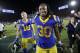 Los Angeles Rams running back Todd Gurley leaves the field with wide receiver Cooper Kupp after their teams win against the Seattle Seahawks in an NFL football game Sunday, Dec. 8, 2019, in Los Angeles. (AP Photo/Marcio Jose Sanchez)