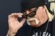 Professional wrestler Hulk Hogan poses for photographers at the premiere of the HBO documentary film