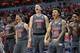LOUISVILLE, KENTUCKY - DECEMBER 06: Samuell Wiliiamson #10, Quinn Slazinski #11 and Josh Nickelberry #20 of the Louisville Cardinals celebrate during the game against the Pittsburgh Panthers at KFC YUM! Center on December 06, 2019 in Louisville, Kentucky. (Photo by Andy Lyons/Getty Images)