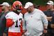 Cleveland Browns wide receiver Odell Beckham Jr. (13) talks with head coach Freddie Kitchens at the team's NFL football training facility in Berea, Ohio, Tuesday, June 4, 2019. (AP Photo/Ron Schwane)