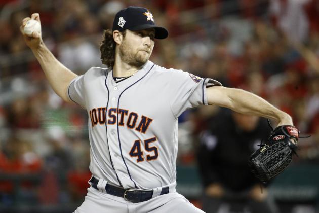 FILE - In this Oct. 27, 2019, file photo, Houston Astros starting pitcher Gerrit Cole throws against the Washington Nationals during the first inning of Game 5 of the baseball World Series in Washington. Gerrit Cole, the top pitcher on the free-agent market, was to meet with New York Yankees officials in California on Tuesday, Dec. 3, 2019. General manager Brian Cashman, manager Aaron Boone and new Yankees pitching coach Matt Blake made the trip to speak with the 29-year-old right-hander, a person familiar with the planning said. The person spoke to The Associated Press on condition of anonymity because the meeting was not announced.(AP Photo/Patrick Semansky, File)