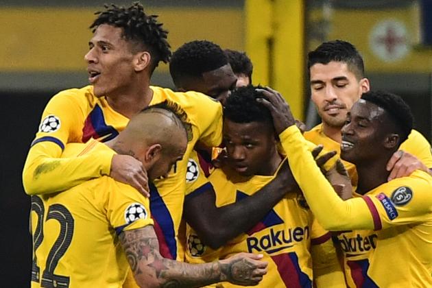Barcelona´s Guinea-Bissau forward Ansu Fati (C) celebrates after scoring  during the UEFA Champions League Group F football match Inter Milan vs Barcelona on December 10, 2019 at the San Siro stadium in Milan. (Photo by Miguel MEDINA / AFP) (Photo by MIGUEL MEDINA/AFP via Getty Images)