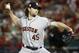 FILE - In this Oct. 27, 2019, file photo, Houston Astros starting pitcher Gerrit Cole throws against the Washington Nationals during the first inning of Game 5 of the baseball World Series in Washington. Gerrit Cole, the top pitcher on the free-agent market, was to meet with New York Yankees officials in California on Tuesday, Dec. 3, 2019. General manager Brian Cashman, manager Aaron Boone and new Yankees pitching coach Matt Blake made the trip to speak with the 29-year-old right-hander, a person familiar with the planning said. The person spoke to The Associated Press on condition of anonymity because the meeting was not announced.(AP Photo/Patrick Semansky, File)