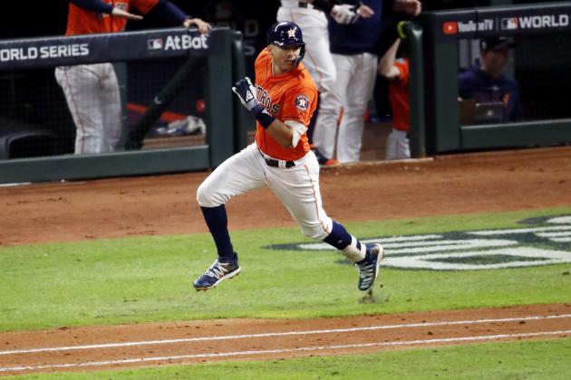 HOUSTON, TEXAS - OCTOBER 30:  Carlos Correa #1 of the Houston Astros hits an RBI single against the Washington Nationals during the fifth inning in Game Seven of the 2019 World Series at Minute Maid Park on October 30, 2019 in Houston, Texas. (Photo by Tim Warner/Getty Images)
