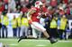 INDIANAPOLIS, INDIANA - DECEMBER 07: Jonathan Taylor #23 of the Wisconsin Badgers runs for a touchdown against the Ohio State Buckeyes during BIG Ten Football Championship Game2 at Lucas Oil Stadium on December 07, 2019 in Indianapolis, Indiana. (Photo by Andy Lyons/Getty Images)