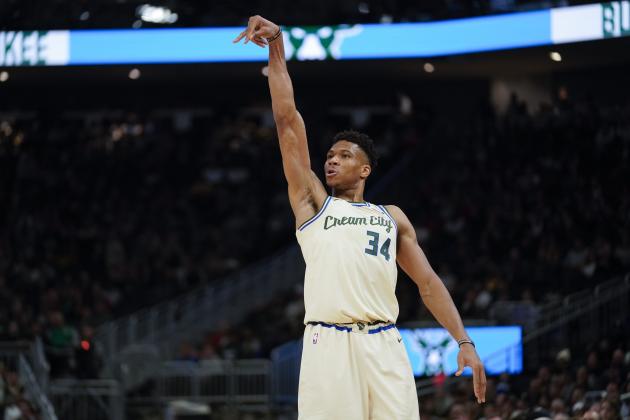 Milwaukee Bucks' Giannis Antetokounmpo reacts to his three-point basket during the second half of an NBA basketball game against the Orlando Magic Monday, Dec. 9, 2019, in Milwaukee. The Bucks won 110-101. (AP Photo/Morry Gash)