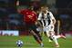 Juventus forward Cristiano Ronaldo drives the ball past ManU forward Marcus Rashford, left, during the Champions League group H soccer match between Manchester United and Juventus at Old Trafford, Manchester, England, Tuesday, Oct. 23, 2018. (AP Photo/Dave Thompson)