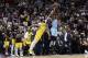 Miami Heat forward Jimmy Butler (22) attempts a three-point basket at the buzzer as Los Angeles Lakers forward Anthony Davis (3) defends during the second half of an NBA basketball game, Friday, Dec. 13, 2019, in Miami. (AP Photo/Lynne Sladky)