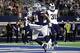ARLINGTON, TEXAS - DECEMBER 15: Ezekiel Elliott #21 of the Dallas Cowboys runs for a touchdown against the Los Angeles Rams in the second quarter at AT&T Stadium on December 15, 2019 in Arlington, Texas. (Photo by Ronald Martinez/Getty Images)