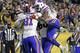 Buffalo Bills tight end Tyler Kroft (81) celebrates with running back Devin Singletary (26) and others after scoring on a pass from quarterback Josh Allen during the second half of an NFL football game against the Pittsburgh Steelers in Pittsburgh, Sunday, Dec. 15, 2019. (AP Photo/Don Wright)
