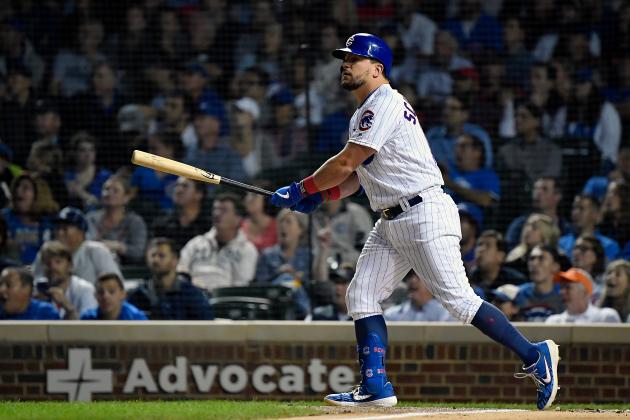 CHICAGO, ILLINOIS - SEPTEMBER 16: Kyle Schwarber #12 of the Chicago Cubs hits a three run home run in the first inning against the Cincinnati Reds at Wrigley Field on September 16, 2019 in Chicago, Illinois. (Photo by Quinn Harris/Getty Images)