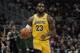 Los Angeles Lakers' LeBron James dribbles during the second half of an NBA basketball game against the Milwaukee Bucks Thursday, Dec. 19, 2019, in Milwaukee. The Bucks won 111-104. (AP Photo/Morry Gash)