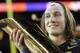 FILE - In this Jan. 7, 2019, file photo, Clemson's Trevor Lawrence holds the trophy after the NCAA college football playoff championship game against Alabama, in Santa Clara, Calif. For the first time, the defending national champion Tigers are No. 1 in The Associated Press preseason Top 25 presented by Regions Bank, Monday, Aug. 19, 2019. Clemson won its second national title in three seasons behind freshman quarterback Trevor Lawrence to claim equal standing with Alabama at the top of the sport. (AP Photo/David J. Phillip, File)