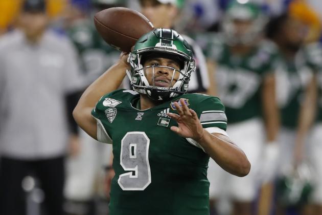 Eastern Michigan quarterback Mike Glass III (9) throws during the first half of the Quick Lane Bowl NCAA college football game against Pittsburgh, Thursday, Dec. 26, 2019, in Detroit. (AP Photo/Carlos Osorio)