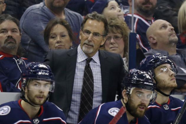 Columbus Blue Jackets coach John Tortorella, top, is seen against the Philadelphia Flyers during an NHL hockey game in Columbus, Ohio, Friday, Feb. 16, 2018. The Flyers won 2-1 in overtime. (AP Photo/Paul Vernon)