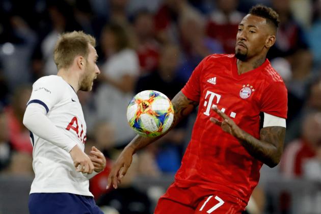MUNICH, GERMANY - JULY 31: (L-R) Christian Eriksen of Tottenham Hotspur, Jerome Boateng of Bayern Munchen during the Audi Cup match between Tottenham Hotspur v Bayern Munchen at the Allianz Arena on July 31, 2019 in Munich Germany (Photo by Rico Brouwer/Soccrates/Getty Images)