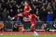 Liverpool's English midfielder Curtis Jones (L) celebrates after scoring the opening goal of the English FA Cup third round football match between Liverpool and Everton at Anfield in Liverpool, north west England on January 5, 2020. (Photo by Paul ELLIS / AFP) / RESTRICTED TO EDITORIAL USE. No use with unauthorized audio, video, data, fixture lists, club/league logos or 'live' services. Online in-match use limited to 120 images. An additional 40 images may be used in extra time. No video emulation. Social media in-match use limited to 120 images. An additional 40 images may be used in extra time. No use in betting publications, games or single club/league/player publications. / (Photo by PAUL ELLIS/AFP via Getty Images)
