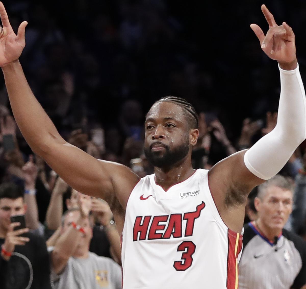 Dwyane Wade celebrates Miami Heat jersey retirement