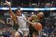 Connecticut's Crystal Dangerfield, left, fouls Baylor's Te'a Cooper during the first half of an NCAA college basketball game Thursday, Jan. 9, 2020, in Hartford, Conn. (AP Photo/Jessica Hill)
