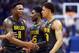 LAWRENCE, KANSAS - JANUARY 11: Mark Vital #11 and Davion Mitchell #45 of the Baylor Bears congratulate MaCio Teague #31 after a basket during the game against the Kansas Jayhawks at Allen Fieldhouse on January 11, 2020 in Lawrence, Kansas. (Photo by Jamie Squire/Getty Images)
